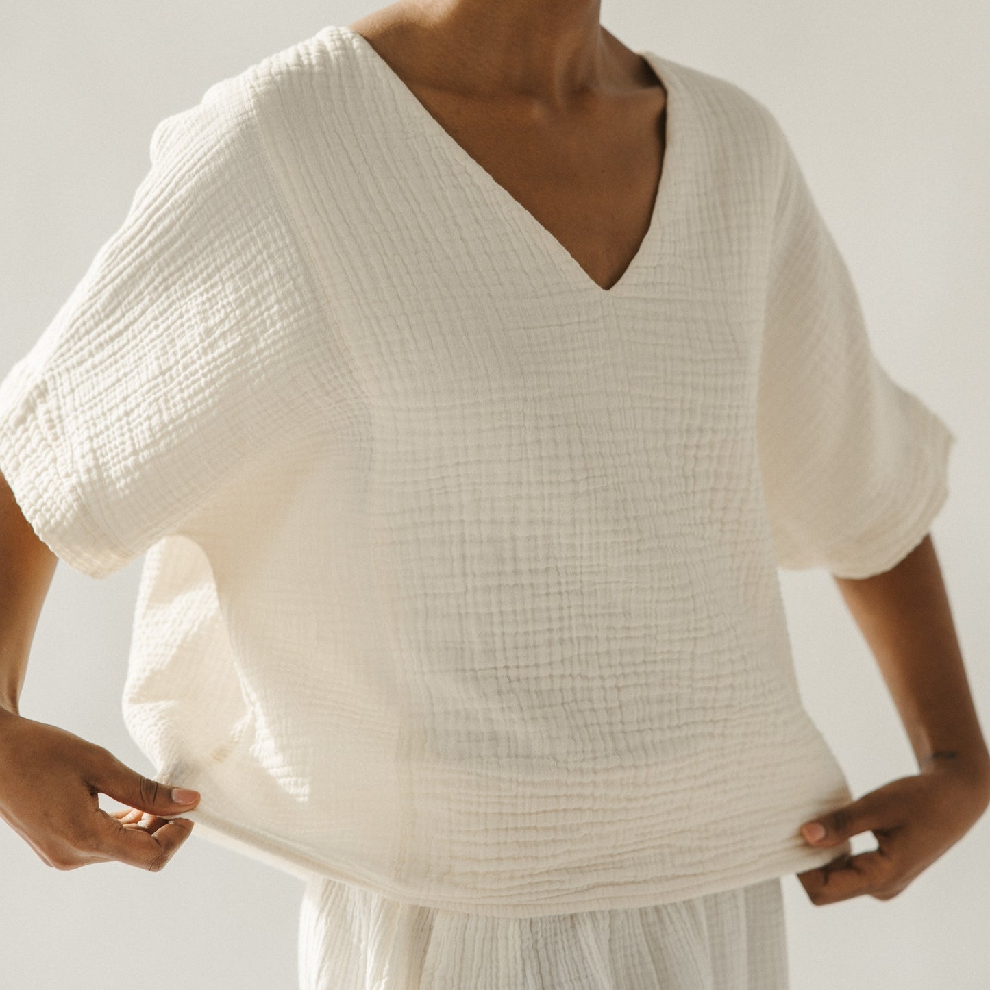 POKOLOKO Crinkle V Neck Top #color_crinkle-cream