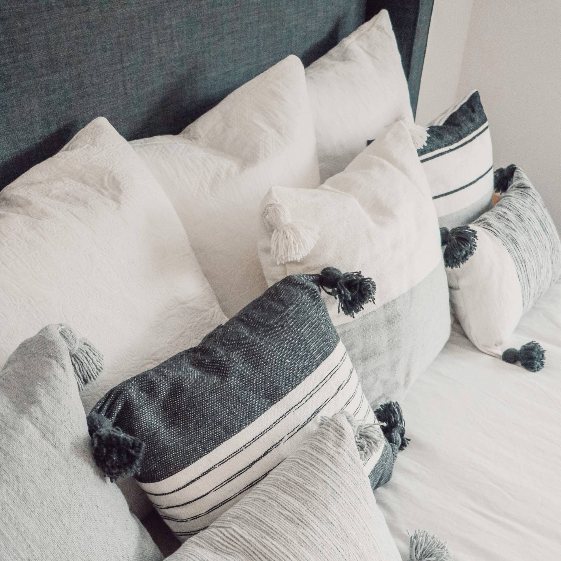 POKOLOKO Half Light Grey Pom Pom Pillow - 20x20" #color_half-light-grey