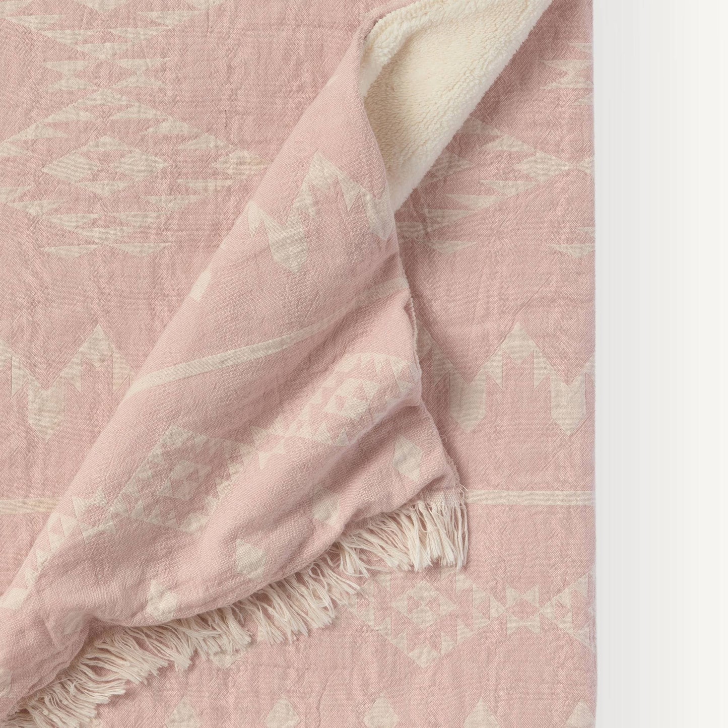 POKOLOKO Atlas Fleece-Lined Throw #color_atlas-pastel-pink