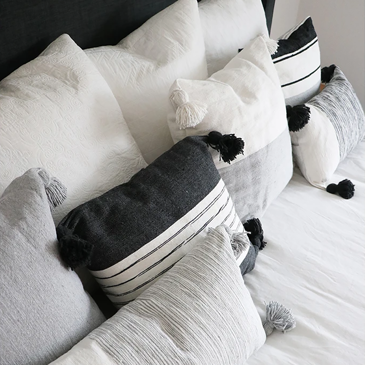 POKOLOKO Belted Charcoal Pom Pom Pillow - 18x18" #color_belted-charcoal