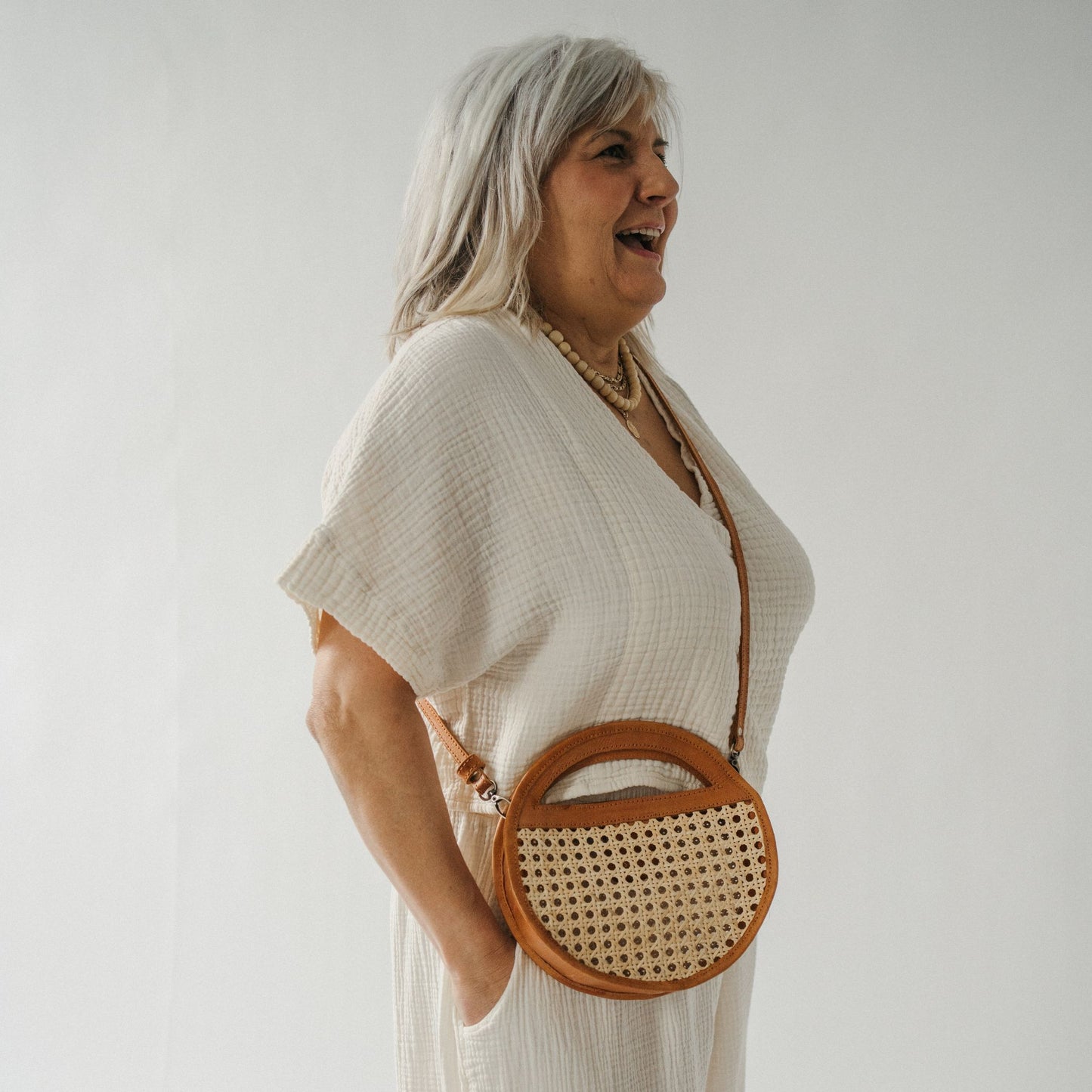 POKOLOKO Round Leather Bag with Cane Accent #color_caramel